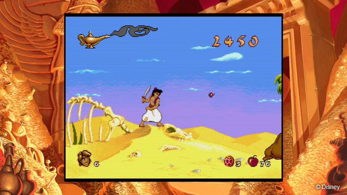 Disney Classic Games - אלאדין עם חרב על דיונה במדבר, מנורת הג'יני וניקוד בפינה